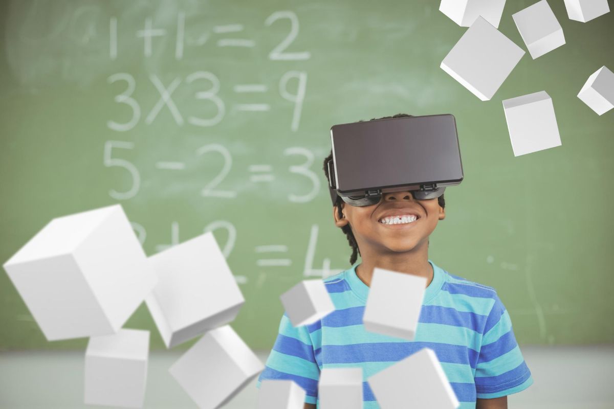 Garoto em aula com óculos de realidade virtual